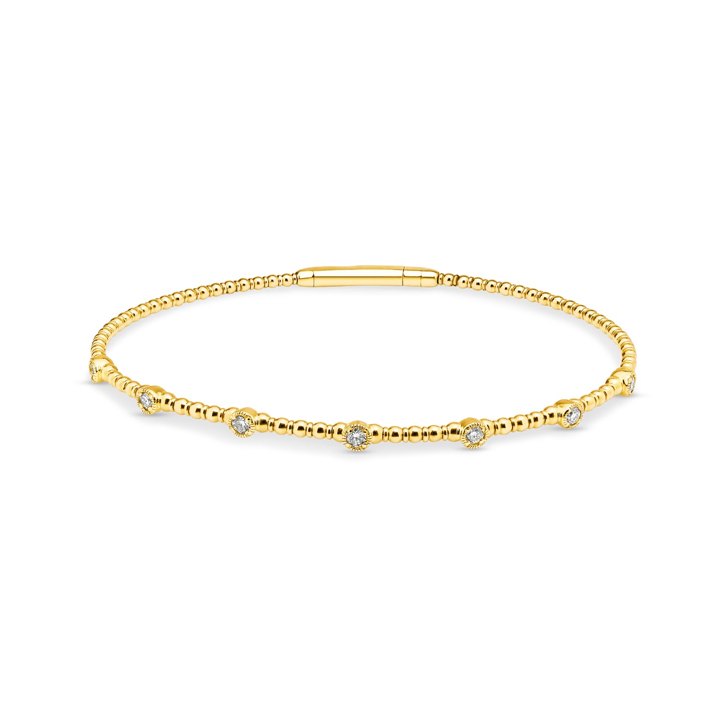 14ct yellow gold granule style bangle featuring 7 diamonds set into individual round stations weighing a total of 0.24ct. Flexi-style bangle with an easy close clasp