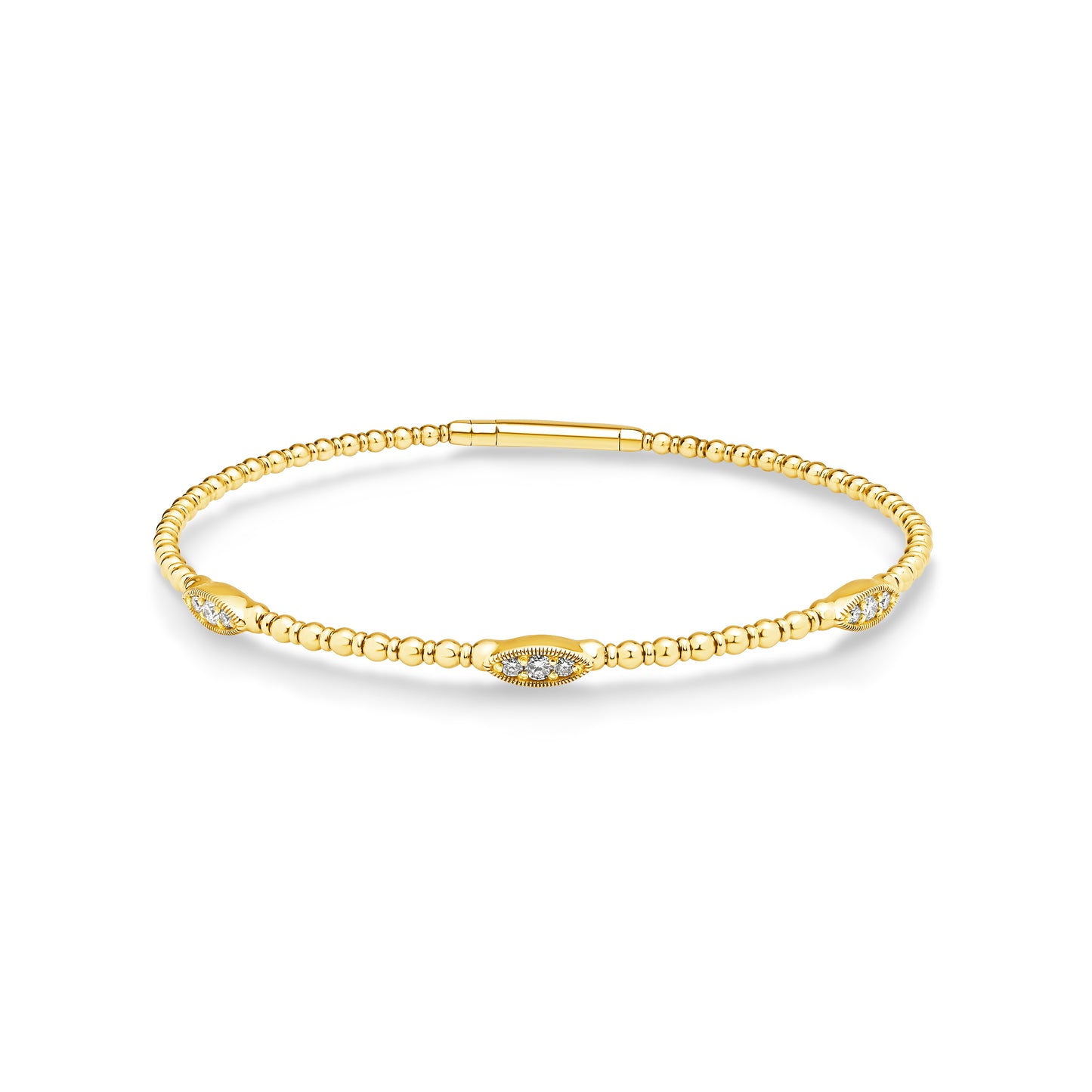 14ct yellow gold granule style bangle featuring 9 diamonds set into 3 oval shaped stations weighing a total of 0.20ct. Flexi-style bangle with easy close clasp