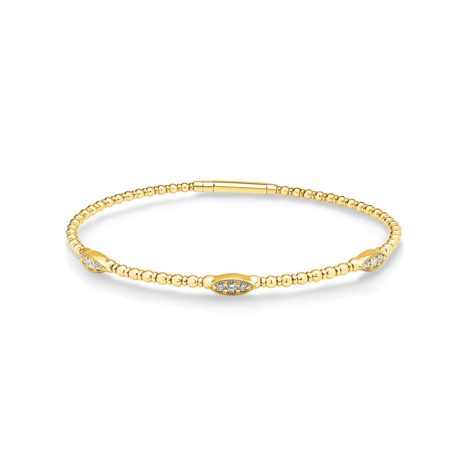 14ct yellow gold granule style bangle featuring 9 diamonds set into 3 oval shaped stations weighing a total of 0.20ct. Flexi-style bangle with easy close clasp