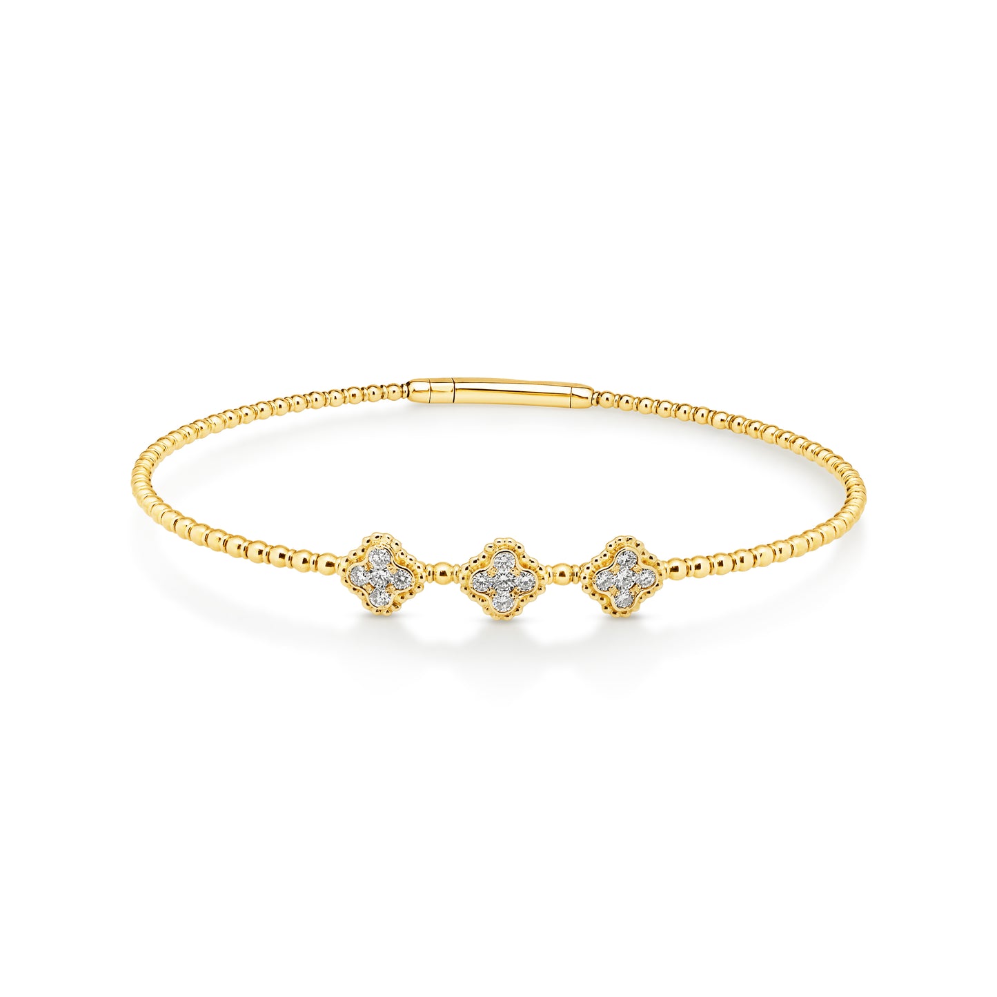 14ct yellow gold granule style bangle featuring 15 diamonds set into 3 clover shaped stations weighing a total of 0.32ct. Flexi-style bangle with an easy close clasp