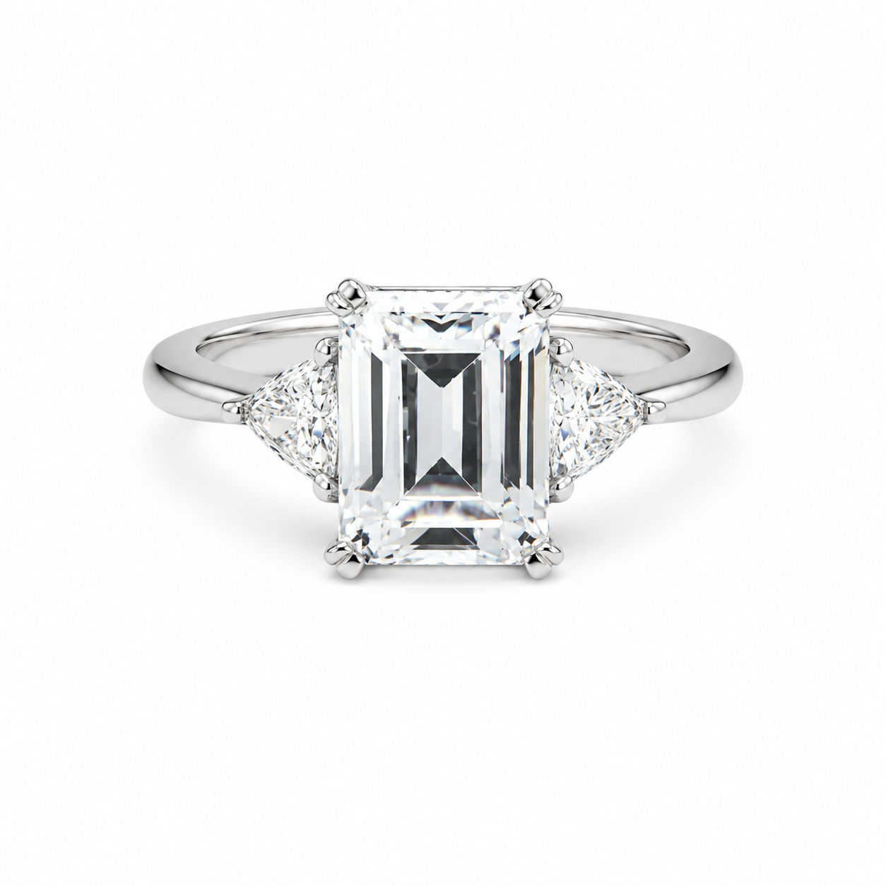 White Gold Trilogy Emerald and Trillion Cut Diamond Engagement Ring